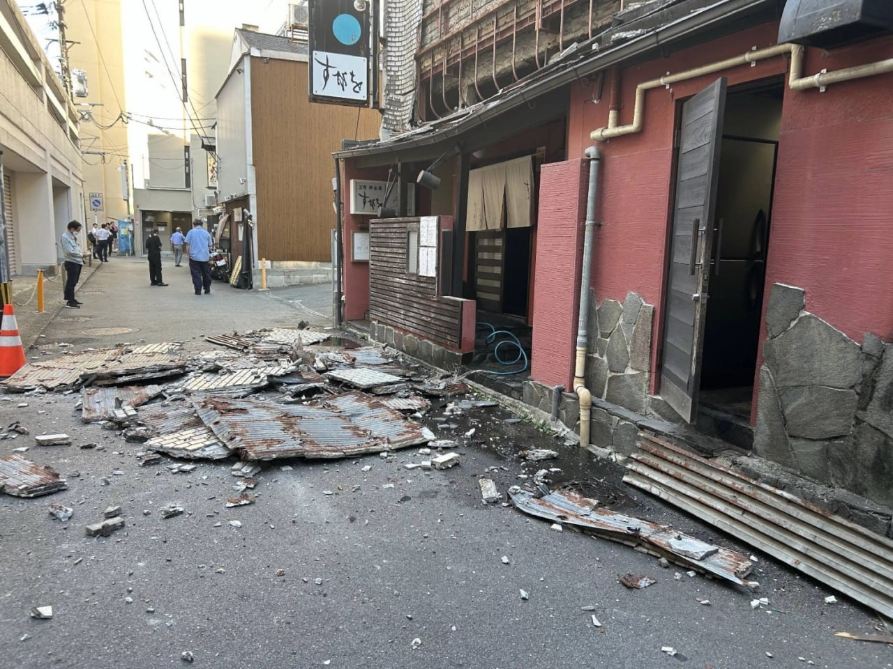 A damaged building in the city of Kumamoto following a massive earthquake on Tuesday afternoon. | JIJI